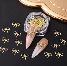 Moños de Metal Dorados con 30pz